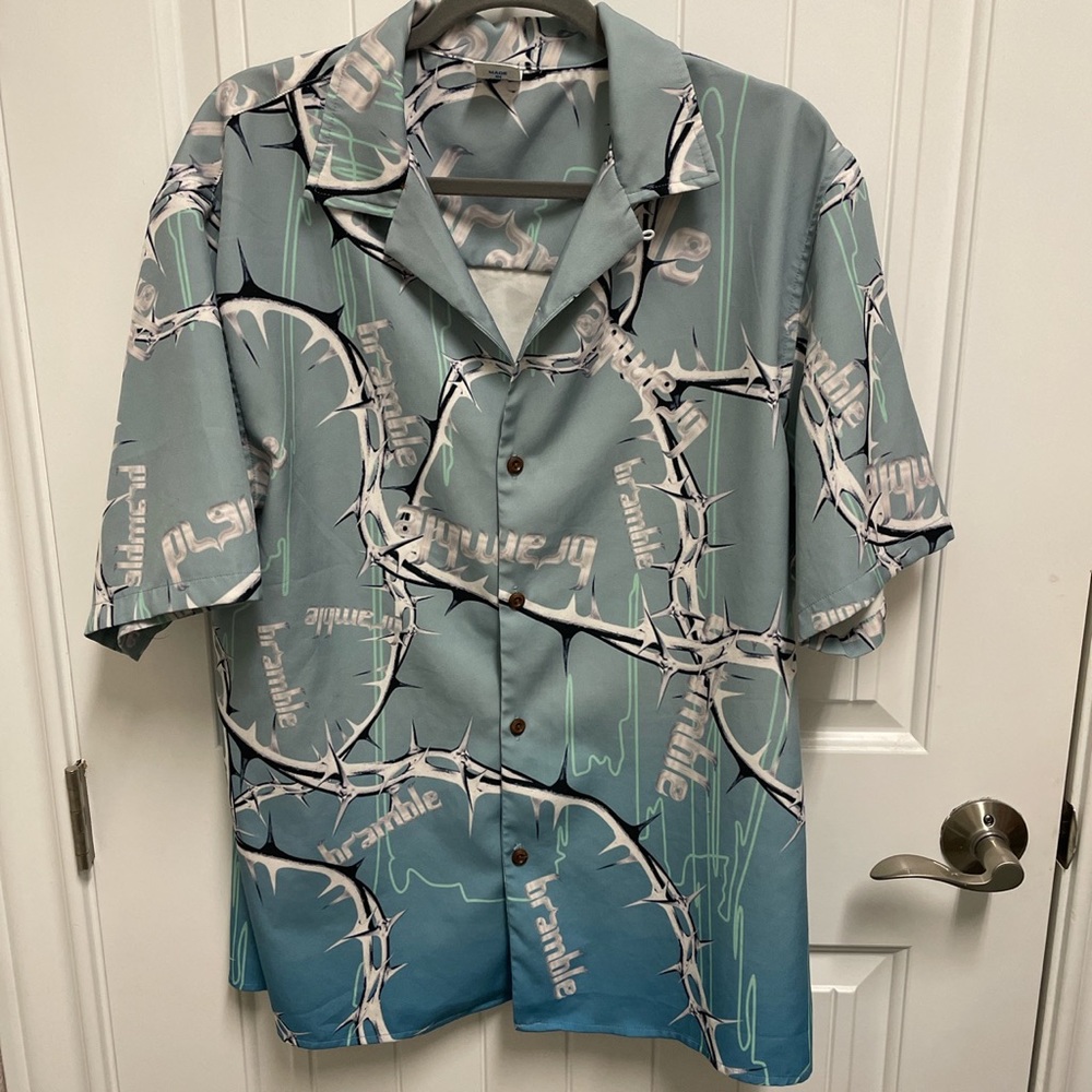 Button up graphic polo shirt